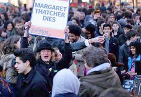 A crowd in Brixton greets the news of Margaret Thatcher's death