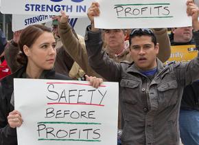 Striking oil workers rally to demand safety come before profits