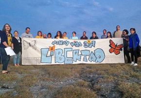 Protesters stand in solidarity with prisoners outside T. Don Hutto detention center