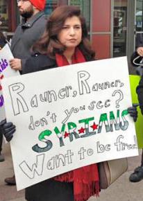 Activists send a message against anti-refugeee bigotry to Gov. Bruce Rauner