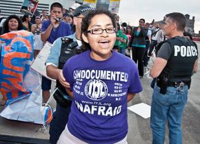 Nadia Sol Ireri Unzueta Carrasco is detained during a civil disobedience action